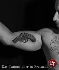 Revolver Tattoo